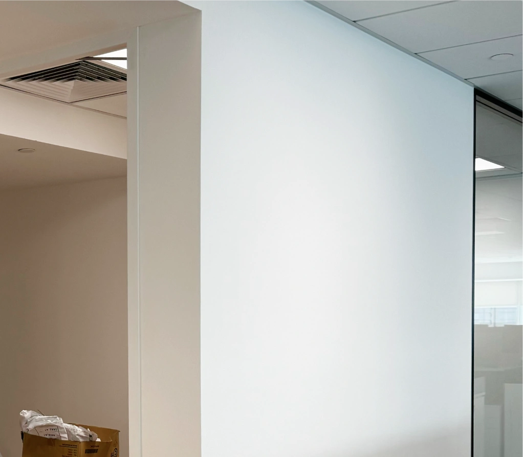 The wall's condition before installing the abstract wallpaper